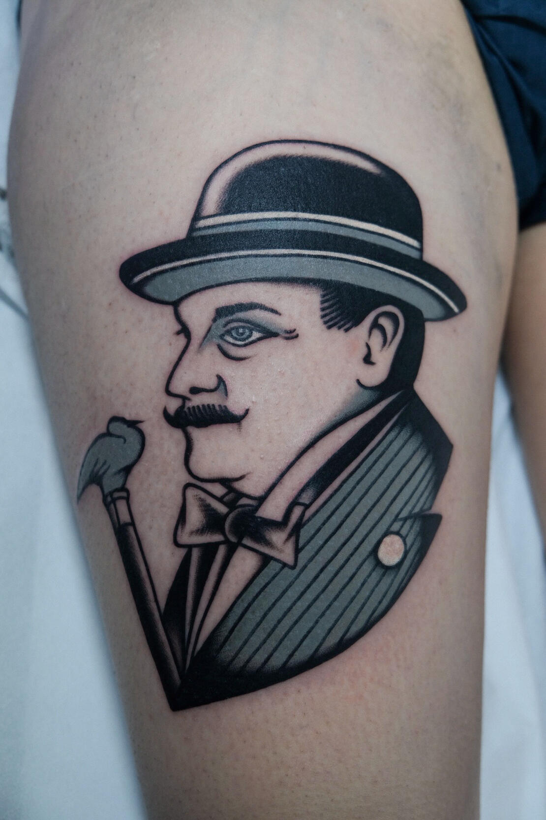 Hercule Poirot portrait tattoo. Black and gray tattoo made in Italy.
